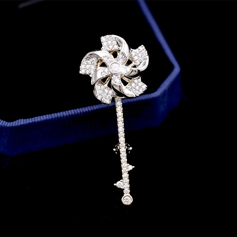 2025 2023 new rotating windmill brooch Korean version autumn and winter suit inlaid with zircon corsage women's coat pin accessories