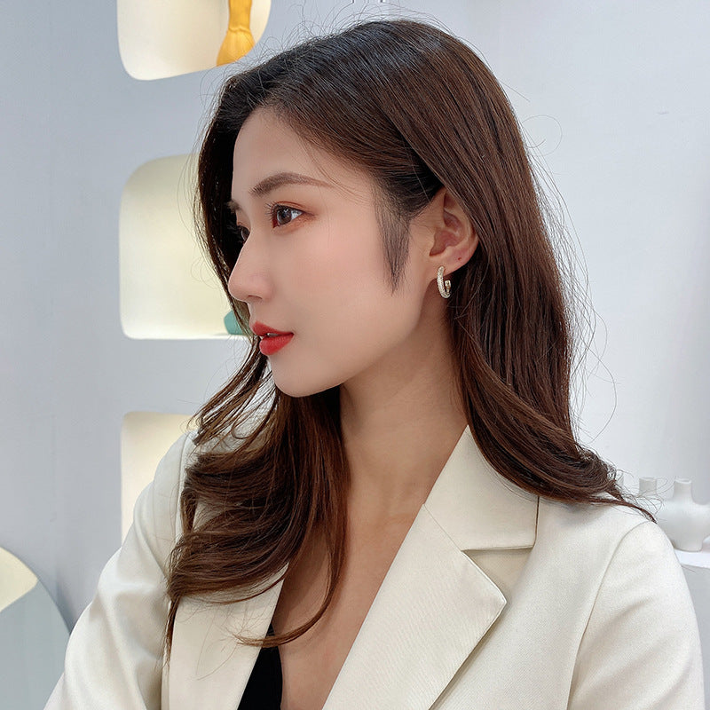2025 Design sense Korean personality earrings temperament geometric zircon earrings 925 silver needle manufacturers wholesale ring earrings