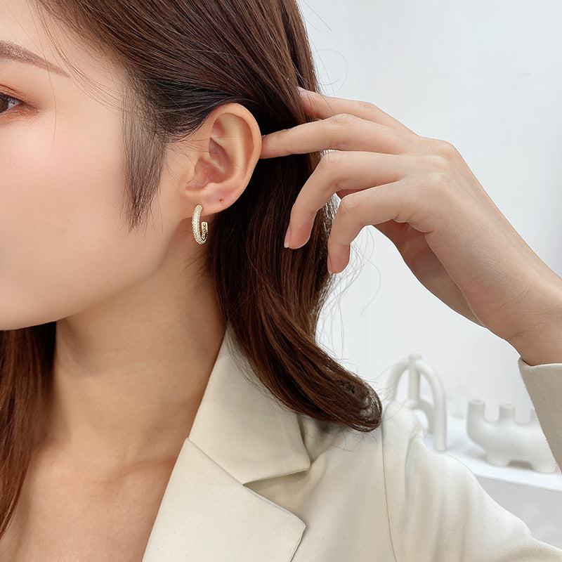 2025 Design sense Korean personality earrings temperament geometric zircon earrings 925 silver needle manufacturers wholesale ring earrings