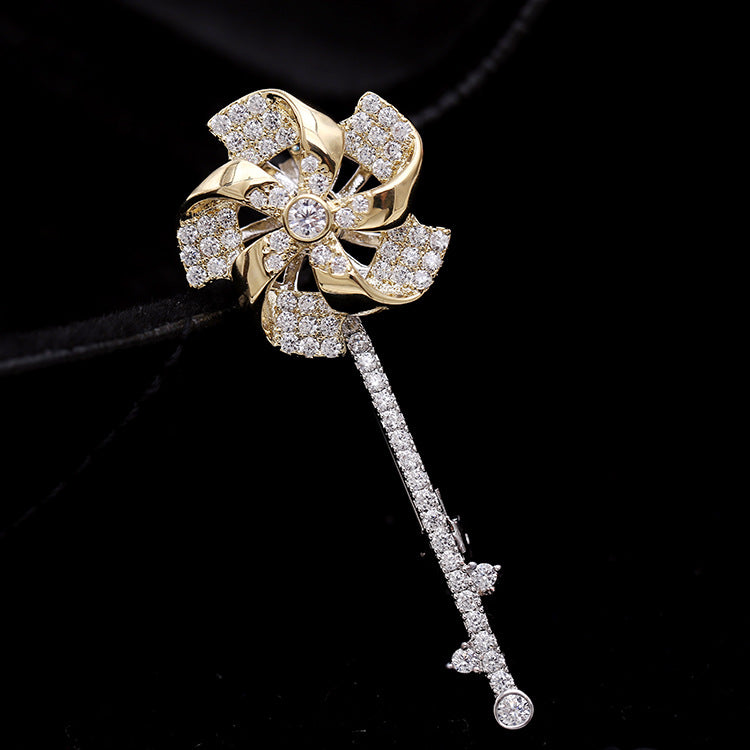2025 2023 new rotating windmill brooch Korean version autumn and winter suit inlaid with zircon corsage women's coat pin accessories