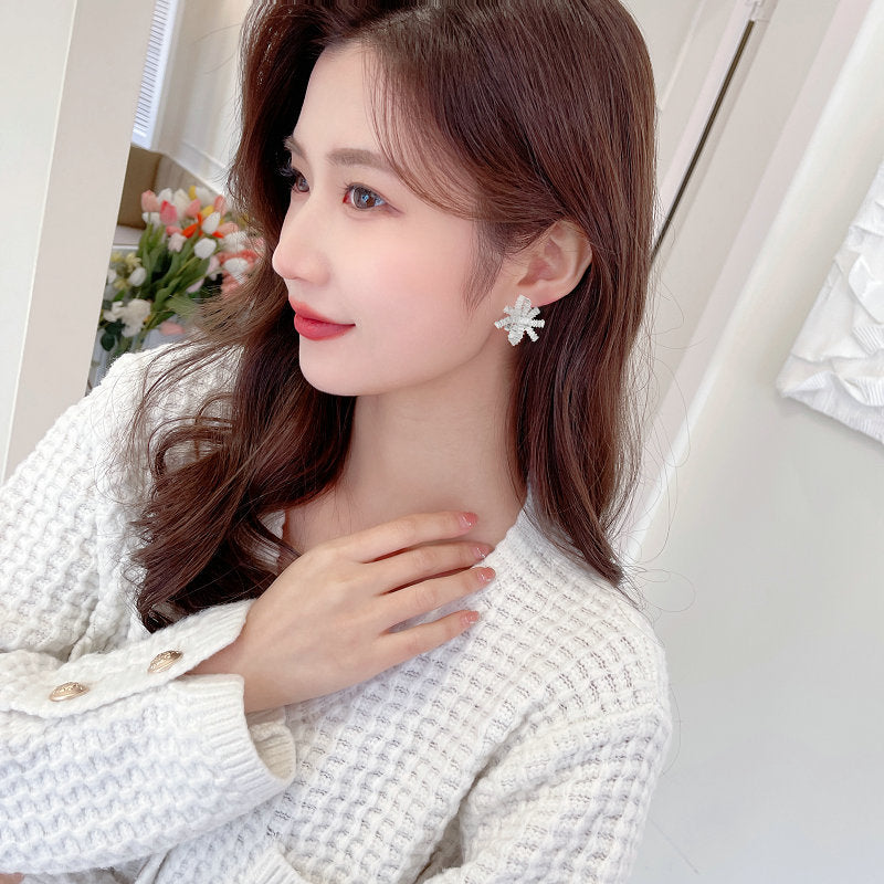 2025 S925 silver needle super flash zircon inlaid earrings women's light luxury high-end wedding earrings streamer bow earrings