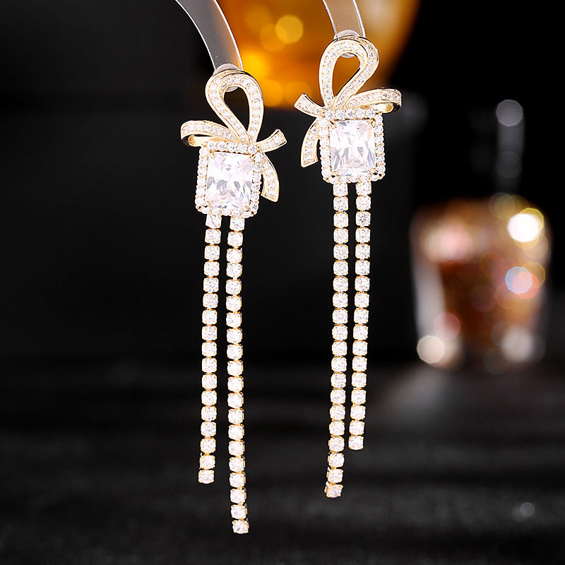 2025 Light luxury high-end earrings wholesale temperament thin earrings square super flash zircon bow long fringed earrings