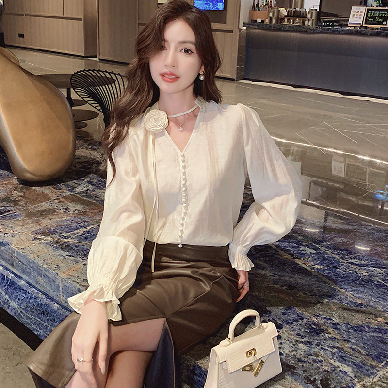 2025 Single-breasted shirt women's spring clothes new Korean version temperament flower decoration long-sleeved bottoming shirt top design sense