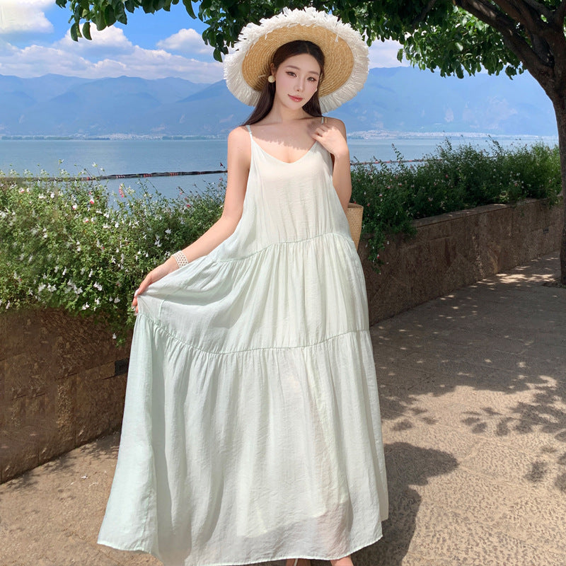 2025 Sanya Thailand seaside vacation dress romantic gentle niche simple temperament suspender swinging beach dress