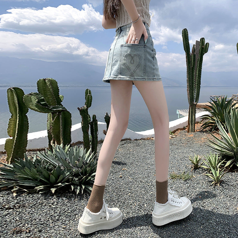 2025 Light-colored denim skirt women's summer popular new high-waisted and thin rear bag embroidered a-word versatile miniskirt