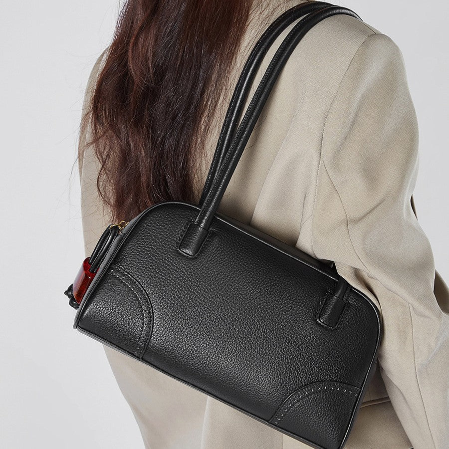 2025 Fashion large-capacity cowhide women's bag popular new niche design handbag first-layer cowhide commuter bowling bag