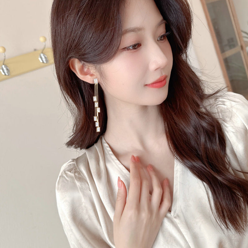 2025 Korean version of temperament fashion earrings women's fringed long geometric zircon earrings earrings s925 silver needle ear jewelry wholesale