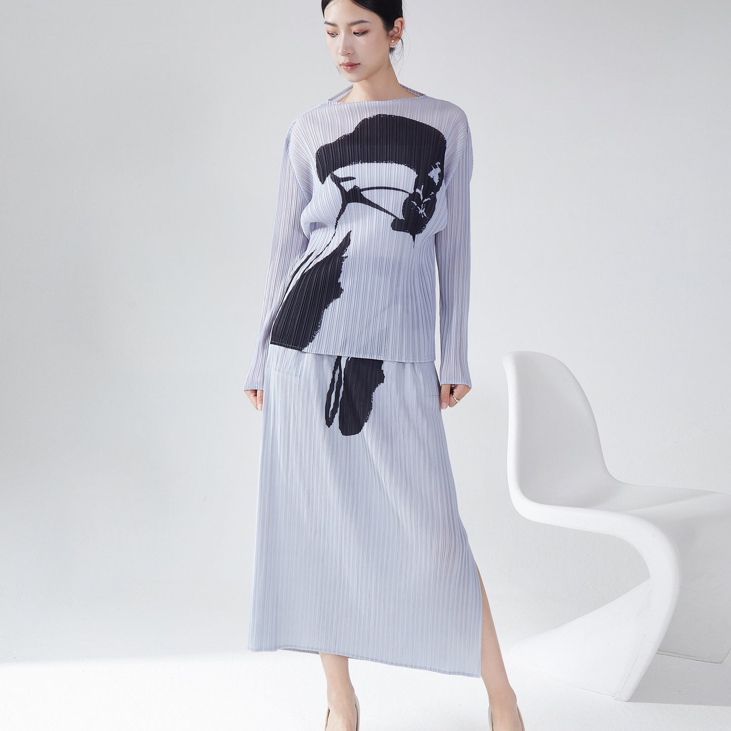 2025 counter women's clothing spring and summer new suit printed loose long-sleeved T-shirt top split skirt two-piece set