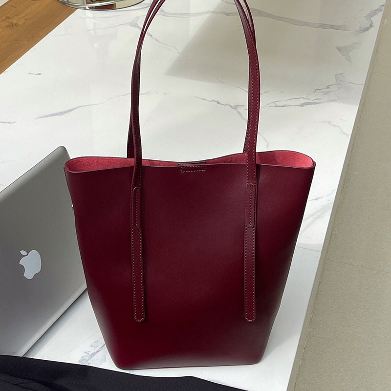 BENPAOLV 2025popular autumn and winter new versatile cowhide wind chimes tote bag women's large-capacity commuting hand-held shoulder leather women's bag