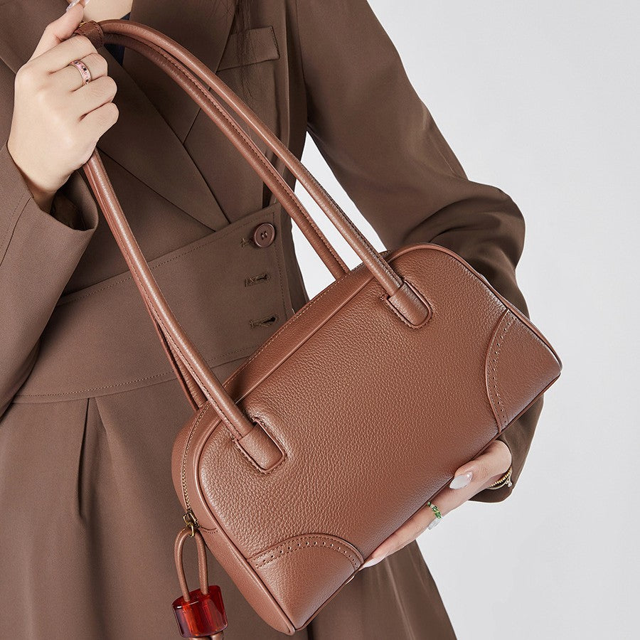 2025 Fashion large-capacity cowhide women's bag popular new niche design handbag first-layer cowhide commuter bowling bag