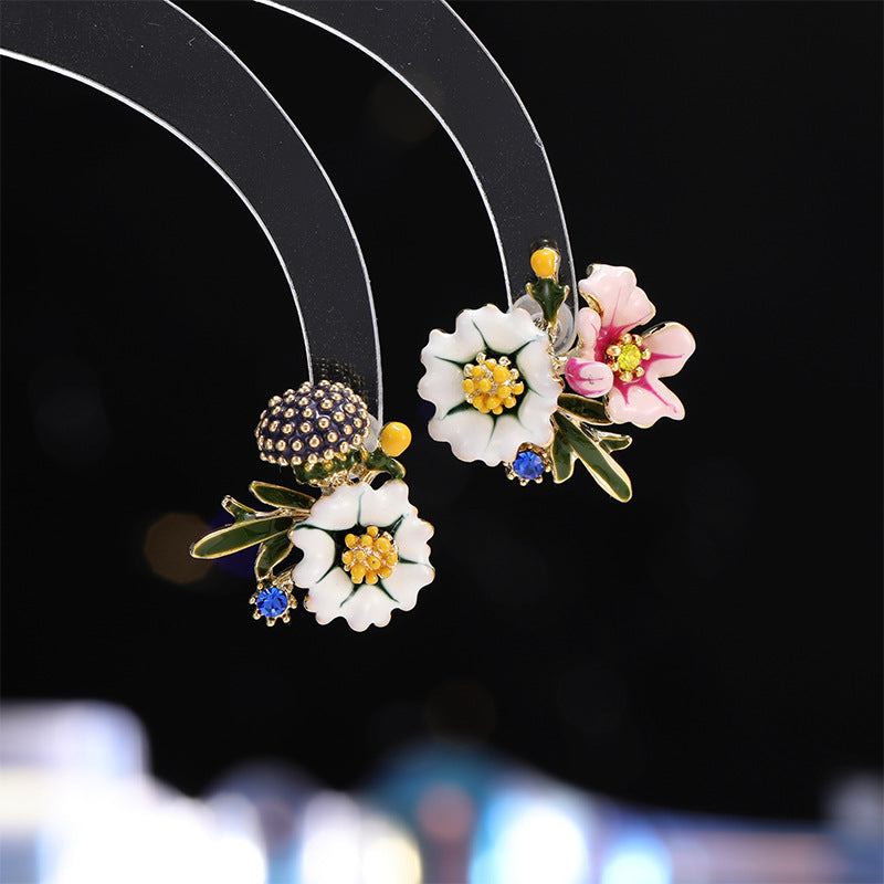 2025 S925 silver needle asymmetric sunflower small daisy fresh stud earrings super fairy sweet temperament versatile personality earrings tide