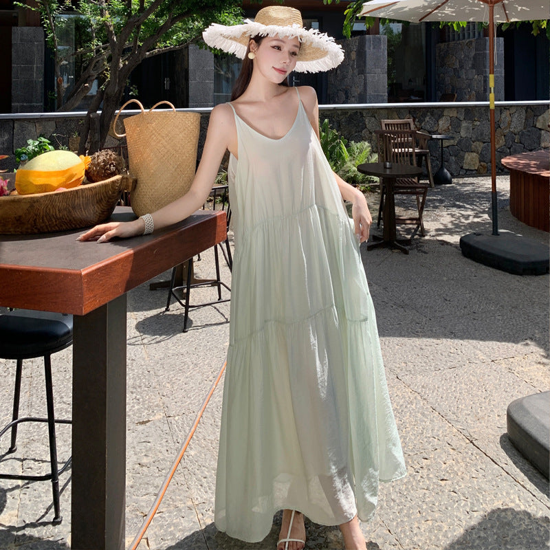 2025 Sanya Thailand seaside vacation dress romantic gentle niche simple temperament suspender swinging beach dress