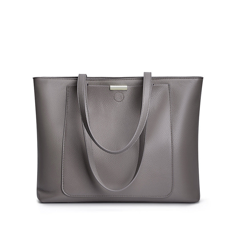 2025 Strictly selected first-layer cowhide tote bag, high-end sense, large-capacity leather women's bag, fashionable and versatile commuter bag