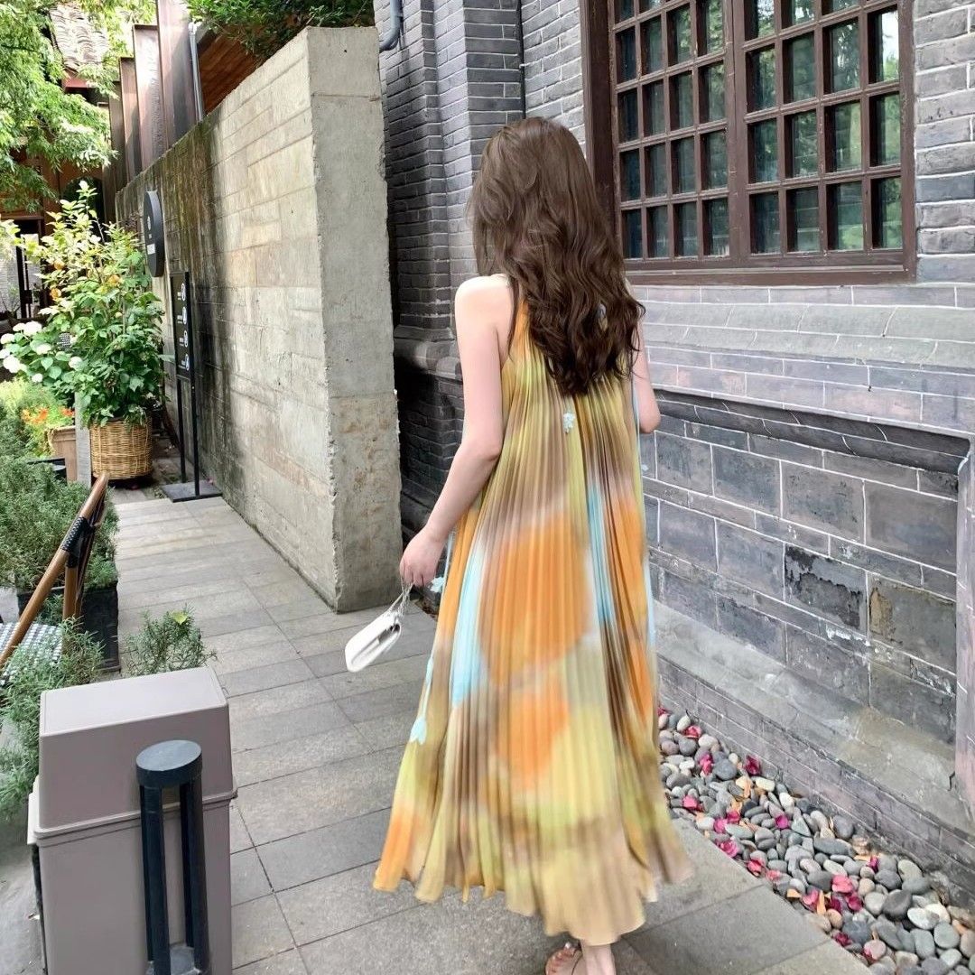 2025 popular summer new smudged sunset mottled suspender skirt women's flower organ pleated temperament lazy dress