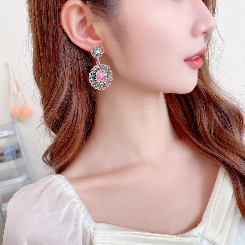2025 New light luxury high-end heavy industry earrings, 2025 style oval hollow pattern inlaid with zircon s925 silver needle earrings