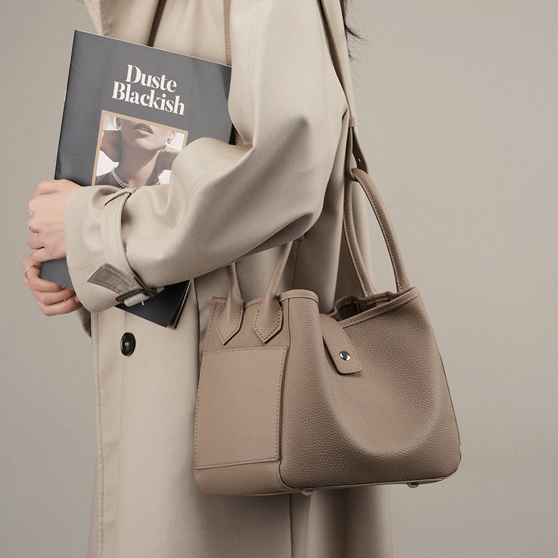 2025 Soft leather bucket bag niche design leather vegetable basket women's bag 2023 new portable commuter first-layer cowhide bag