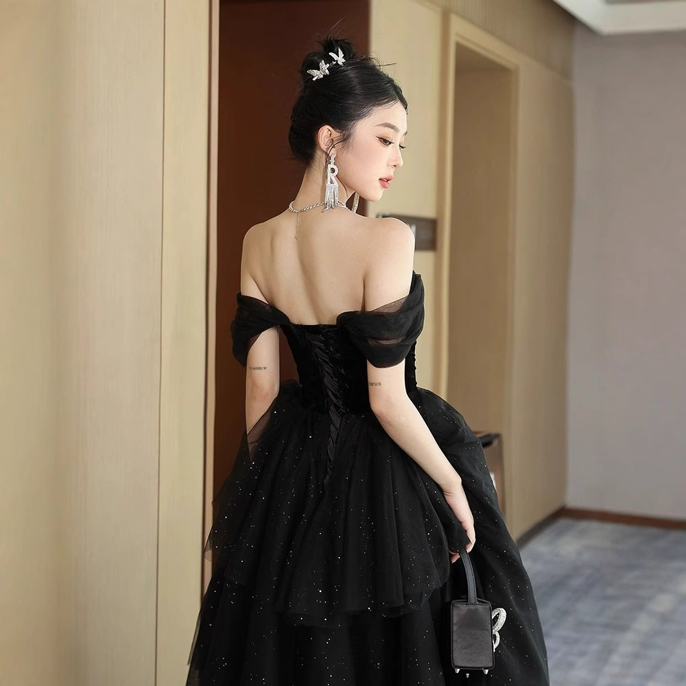 2025 Black evening dress skirt women's high-end one-word shoulder banquet temperament light luxury niche advanced sense host vocal art test
