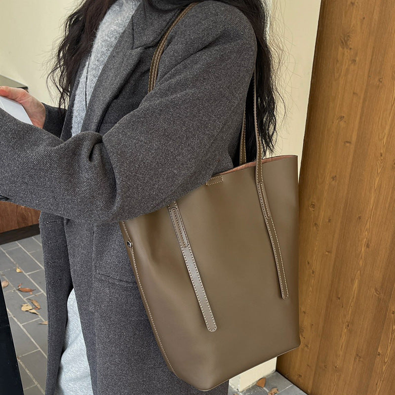 BENPAOLV 2025popular autumn and winter new versatile cowhide wind chimes tote bag women's large-capacity commuting hand-held shoulder leather women's bag