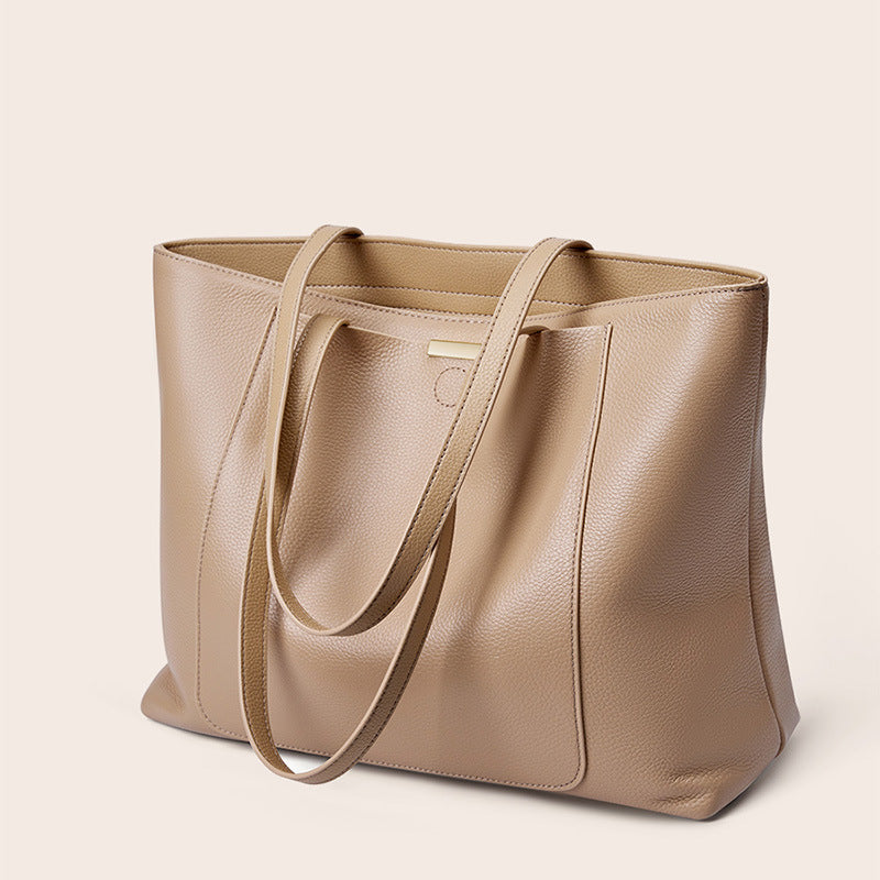 2025 Strictly selected first-layer cowhide tote bag, high-end sense, large-capacity leather women's bag, fashionable and versatile commuter bag