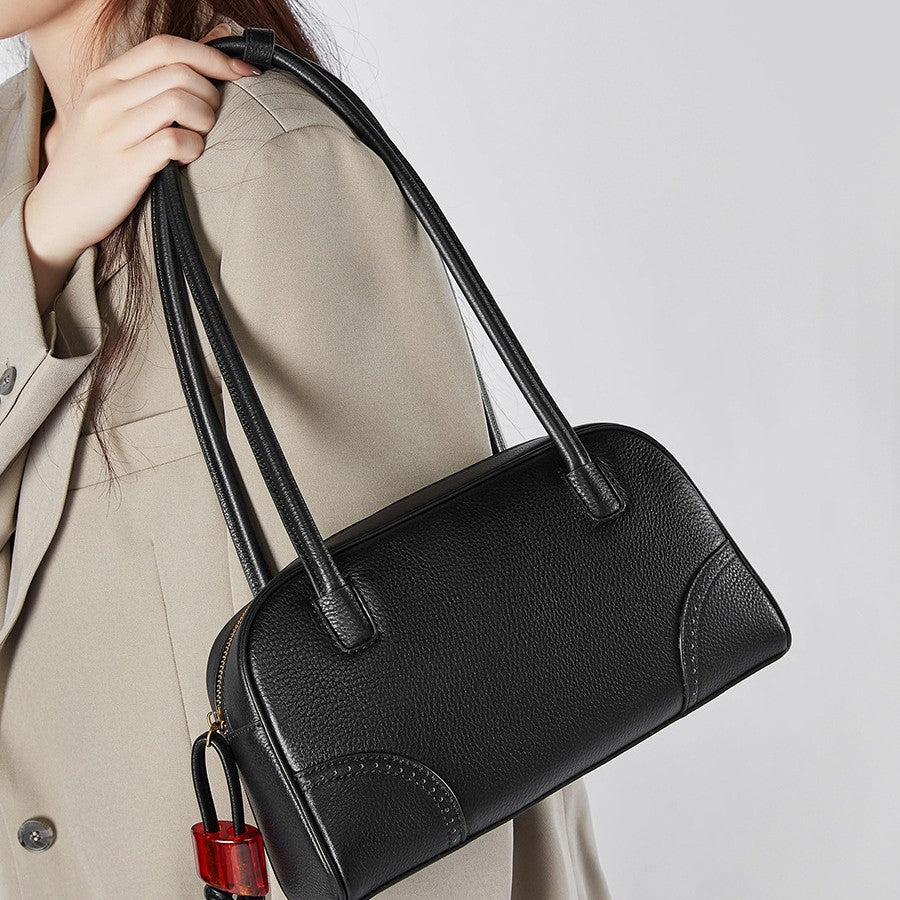 2025 Fashion large-capacity cowhide women's bag popular new niche design handbag first-layer cowhide commuter bowling bag