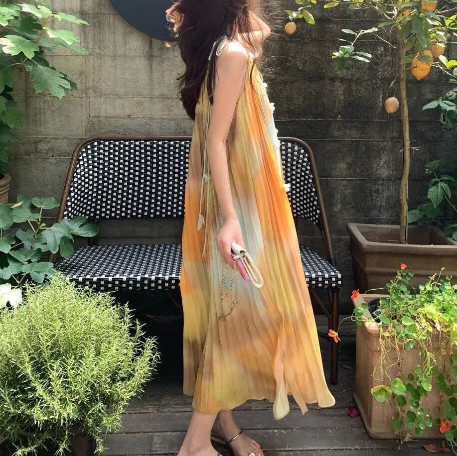 2025 popular summer new smudged sunset mottled suspender skirt women's flower organ pleated temperament lazy dress