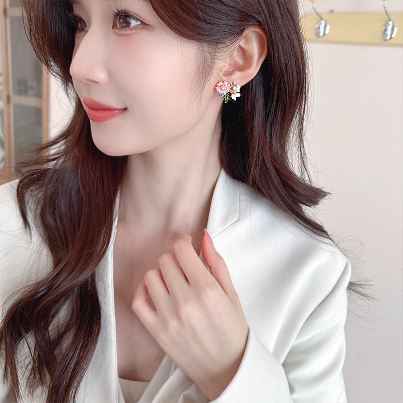 2025 S925 silver needle asymmetric sunflower small daisy fresh stud earrings super fairy sweet temperament versatile personality earrings tide