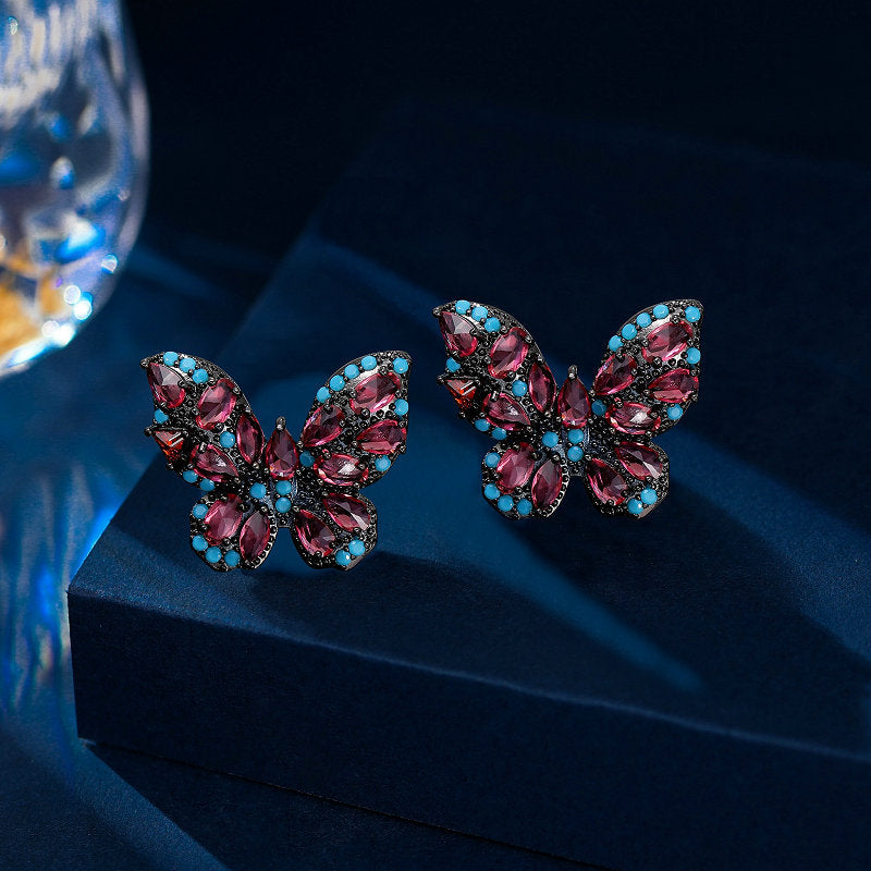 2025 New niche temperament high-end earrings wholesale fashion full diamond color zircon inlaid retro style butterfly stud earrings