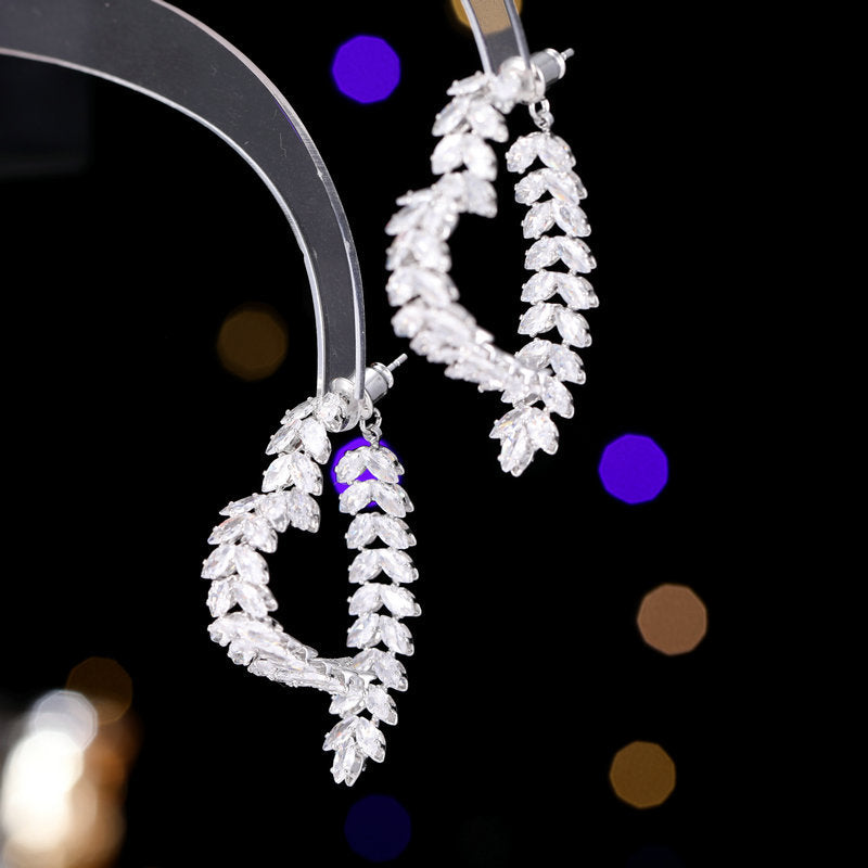 2025 Light luxury front and rear wear high-end super flash zircon earrings, simple and versatile super flash zircon wheat ear heart-shaped earrings for women