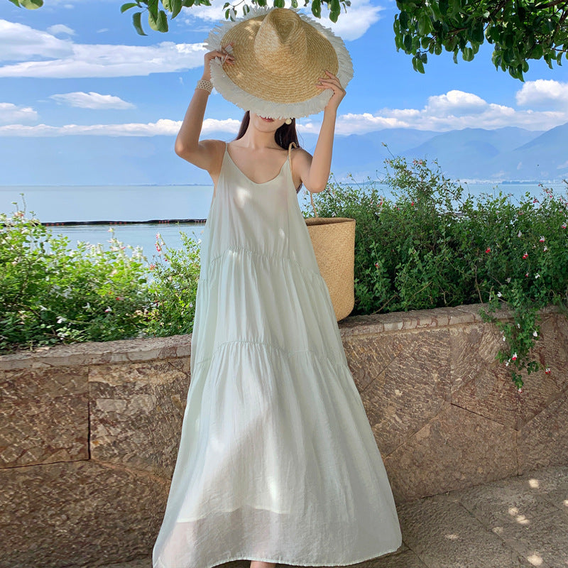 2025 Sanya Thailand seaside vacation dress romantic gentle niche simple temperament suspender swinging beach dress
