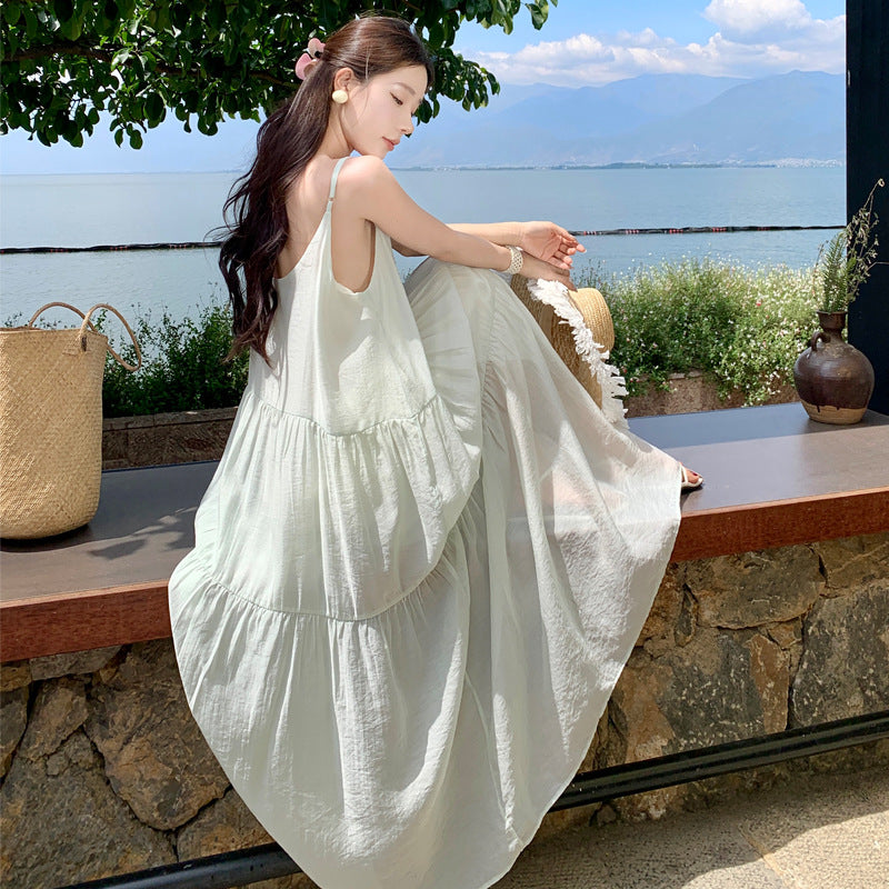 2025 Sanya Thailand seaside vacation dress romantic gentle niche simple temperament suspender swinging beach dress