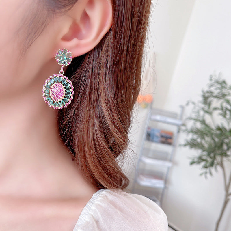 2025 New light luxury high-end heavy industry earrings, 2025 style oval hollow pattern inlaid with zircon s925 silver needle earrings