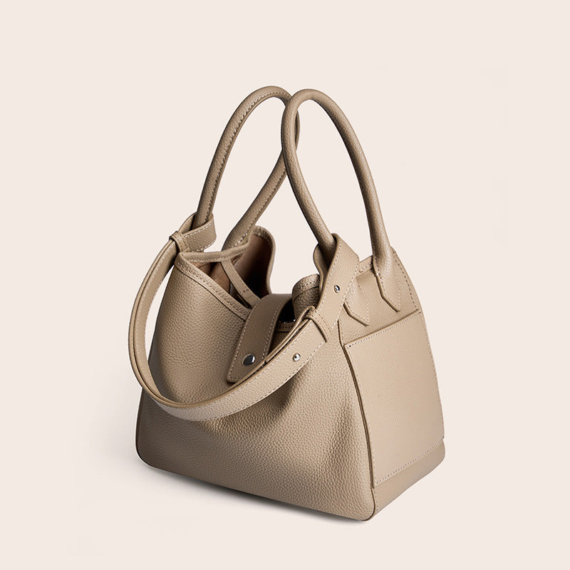 2025 Soft leather bucket bag niche design leather vegetable basket women's bag 2023 new portable commuter first-layer cowhide bag