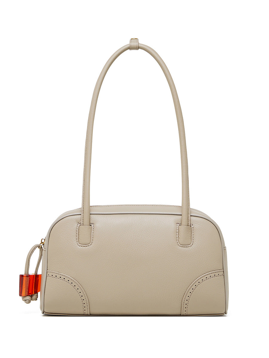 2025 Fashion large-capacity cowhide women's bag popular new niche design handbag first-layer cowhide commuter bowling bag