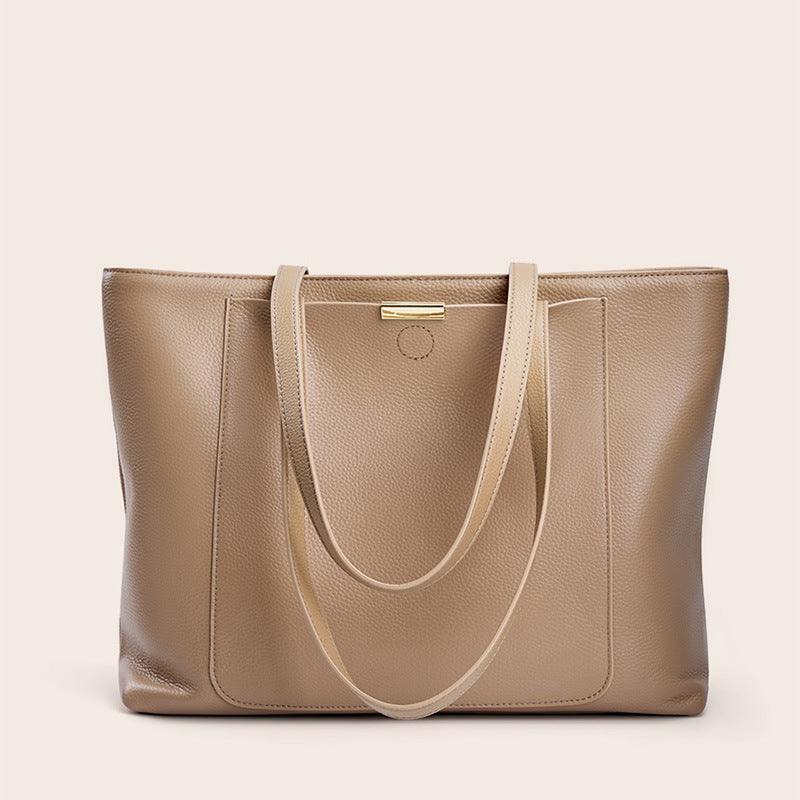 2025 Strictly selected first-layer cowhide tote bag, high-end sense, large-capacity leather women's bag, fashionable and versatile commuter bag