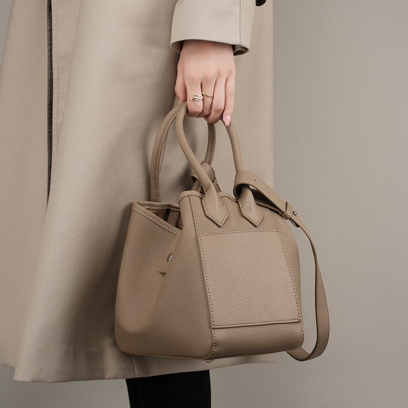 2025 Soft leather bucket bag niche design leather vegetable basket women's bag 2023 new portable commuter first-layer cowhide bag