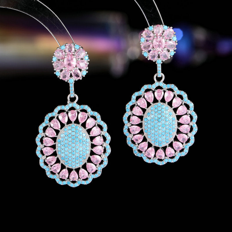 2025 New light luxury high-end heavy industry earrings, 2025 style oval hollow pattern inlaid with zircon s925 silver needle earrings