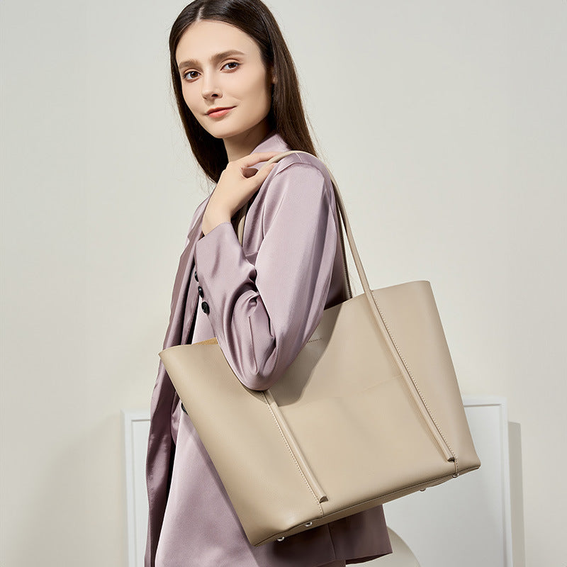 2025 2021 new leather women's bag cowhide commuter shoulder women's bag large capacity portable large bag tote bag