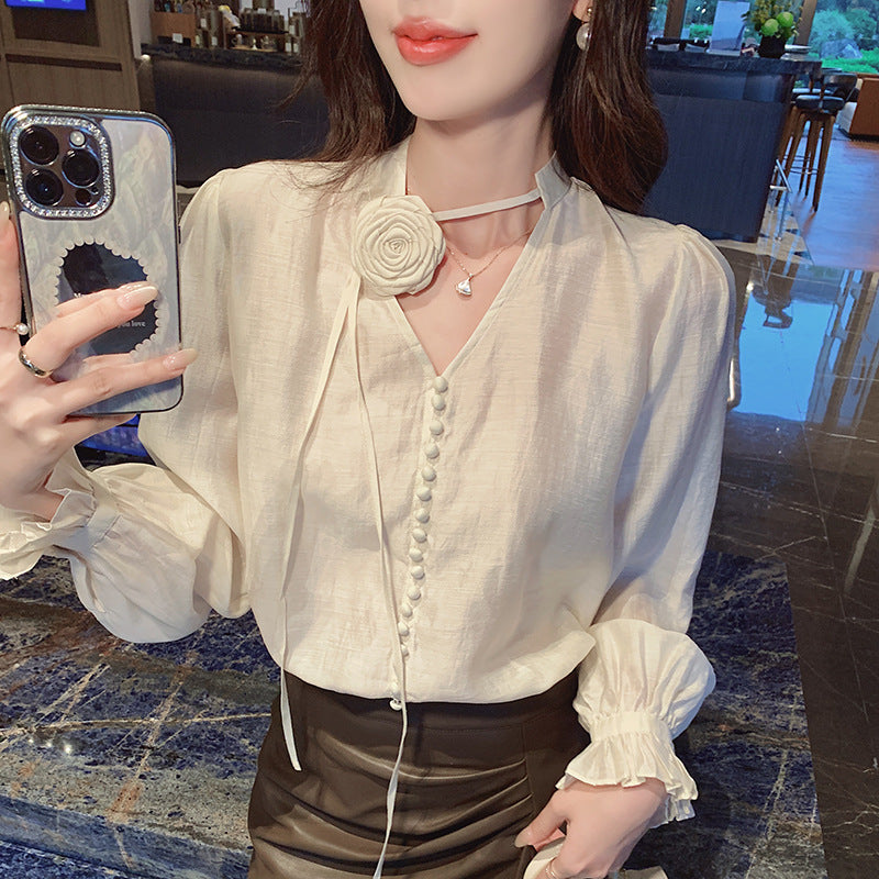 2025 Single-breasted shirt women's spring clothes new Korean version temperament flower decoration long-sleeved bottoming shirt top design sense