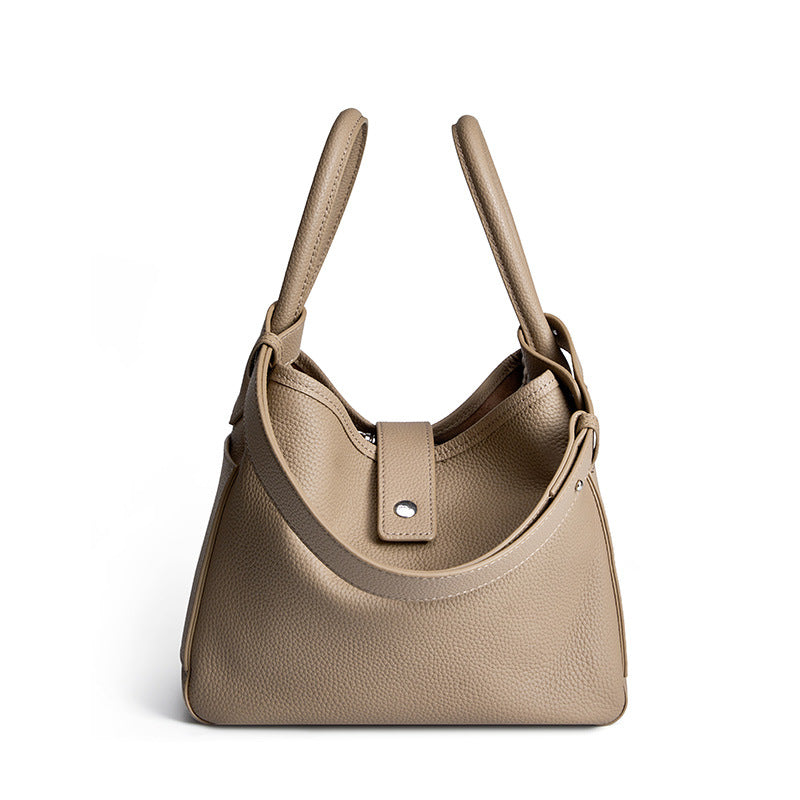 2025 Soft leather bucket bag niche design leather vegetable basket women's bag 2023 new portable commuter first-layer cowhide bag