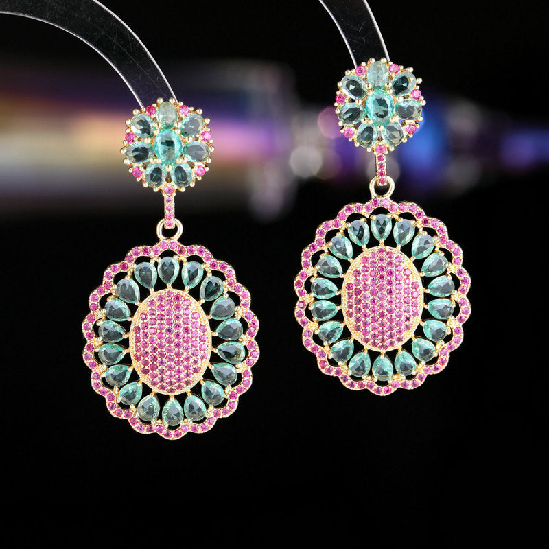 2025 New light luxury high-end heavy industry earrings, 2025 style oval hollow pattern inlaid with zircon s925 silver needle earrings