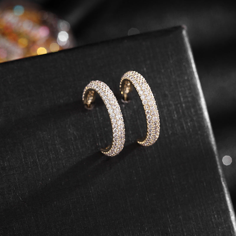 2025 Design sense Korean personality earrings temperament geometric zircon earrings 925 silver needle manufacturers wholesale ring earrings
