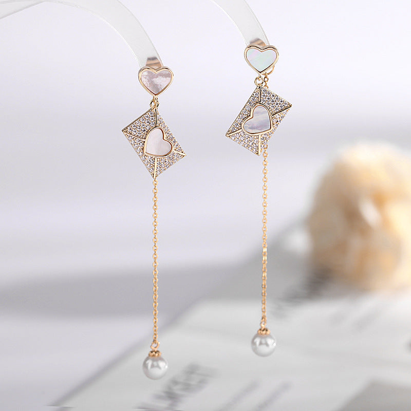 2025 Korean version  new jewelry creative love shell earrings S925 silver needle long fringed pearl earrings women