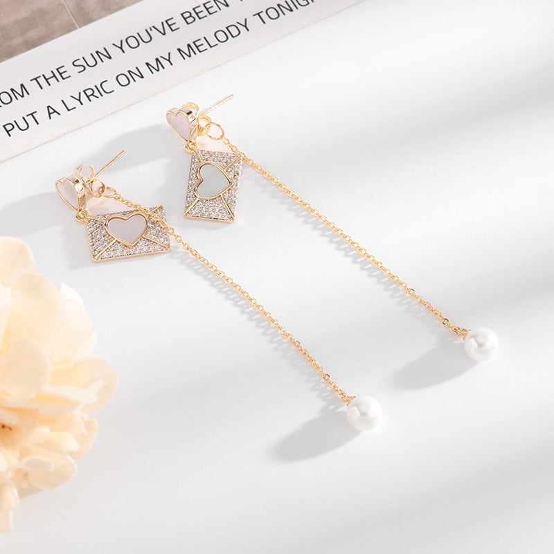 2025 Korean version  new jewelry creative love shell earrings S925 silver needle long fringed pearl earrings women