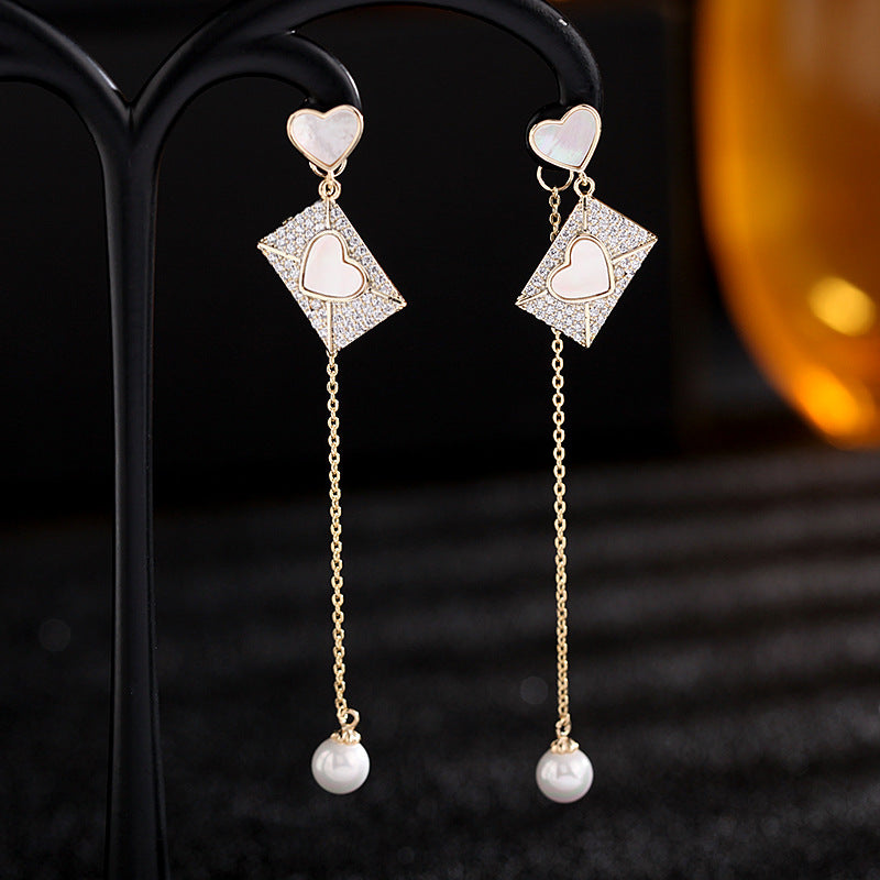 2025 Korean version  new jewelry creative love shell earrings S925 silver needle long fringed pearl earrings women