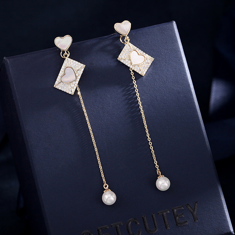 2025 Korean version  new jewelry creative love shell earrings S925 silver needle long fringed pearl earrings women