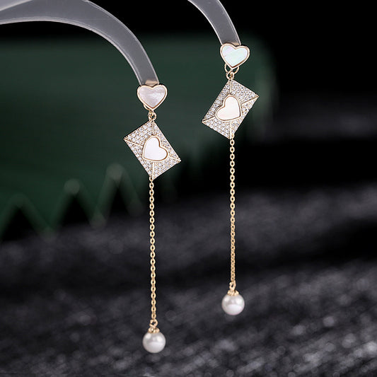 2025 Korean version  new jewelry creative love shell earrings S925 silver needle long fringed pearl earrings women