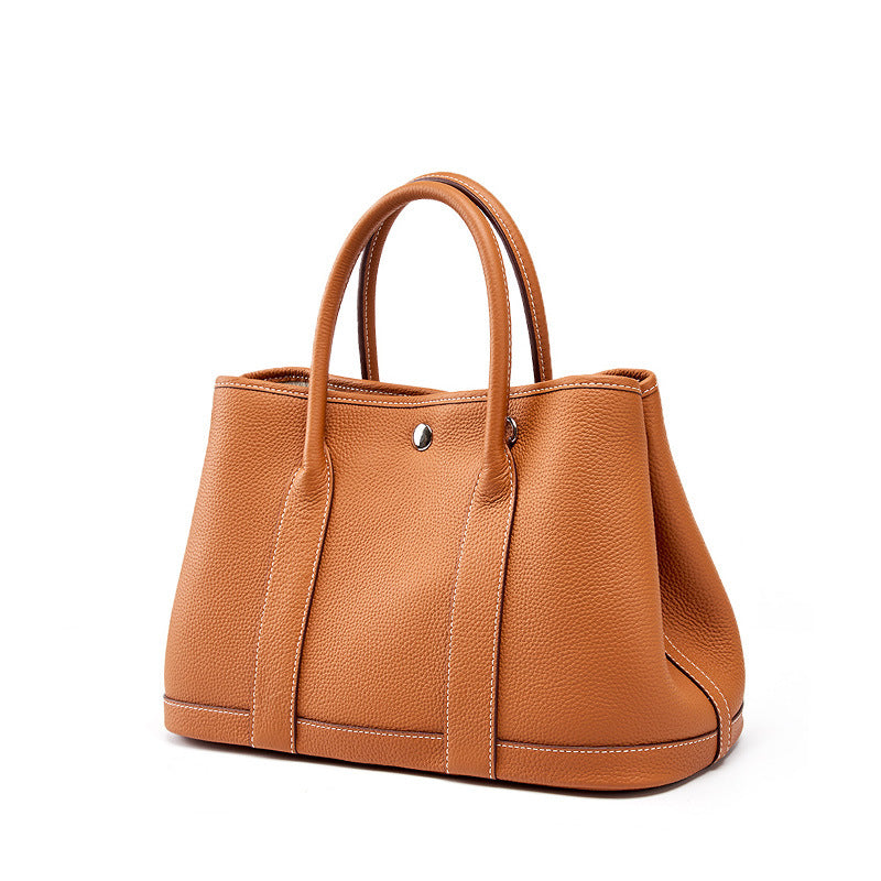 2025 First layer cowhide women's bag  new shoulder messenger bag retro versatile portable large bag bucket bag