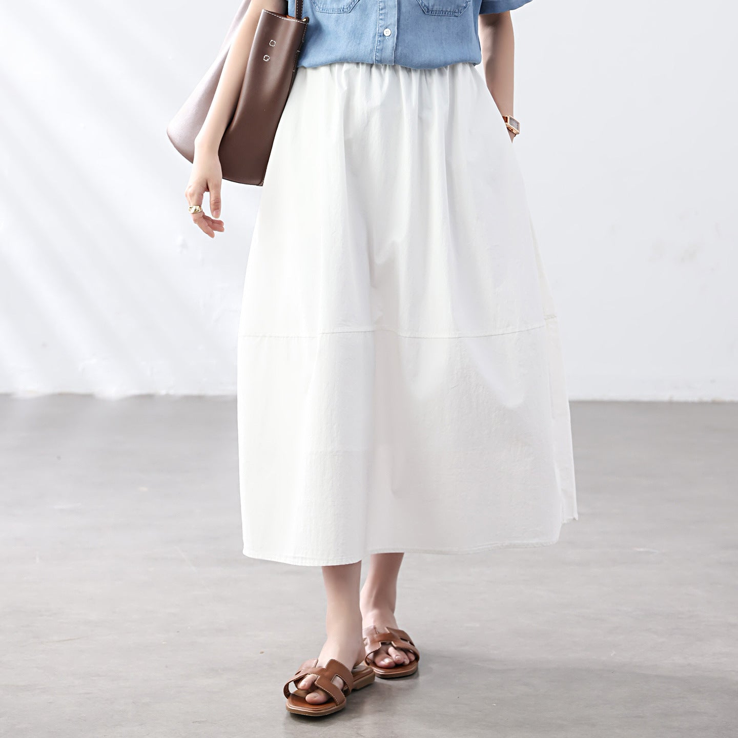 Cotton cocoon, Korean version of Hepburn style high waist and thin A-shaped umbrella skirt, summer drape solid color bud half-length skirt women