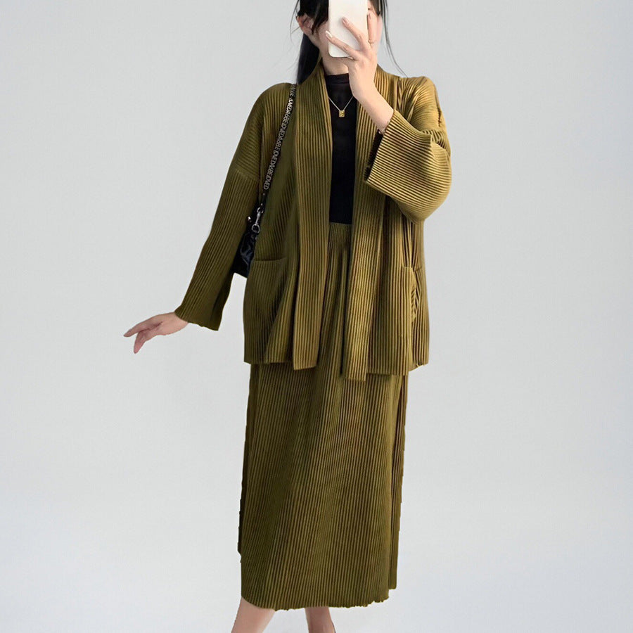 2025 counter autumn and winter suit women's two-piece set, high-end women's clothing loose coat skirt wear a complete set