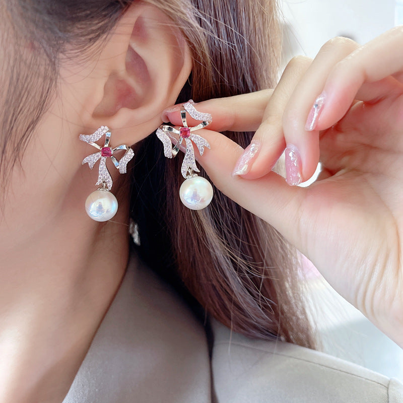 2025 South Korea Dongdaemun new earrings Internet celebrity temperament versatile earrings s925 silver needle streamer bow pearl earrings